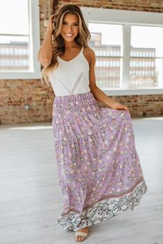 Embrace your wild side with Gibson's Floral Print Maxi Skirt! Designed with a vibrant floral pattern, this skirt will make a statement wherever you go. Its lightweight fabric allows for comfortable movement, making it perfect for any occasion. Be ready to turn heads and feel confident in this must-have addition to your wardrobe. Material:100% Polyester Model info: Models are 5'7", Size 2, wearing smalls Beach Floral Print Rayon Maxi Skirt, Floral Print Relaxed Maxi Skirt For Vacation, Flowy Rayon Maxi Skirt With Floral Print, Floral Print Tiered Maxi Skirt In Rayon, Flowy Floral Print Rayon Skirt, Flowy Floral Rayon Maxi Skirt, Tiered Maxi Skirt With Floral Print, Rayon Floral Print Tiered Maxi Skirt, Floral Print Rayon Tiered Maxi Skirt