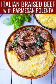 an image of a bowl of food with meat and parmesan polenta in it