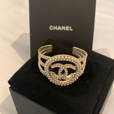 Amazing Chanel Pearl Cuff Bracelet. Makes A Huge Statement! Perfect. No Flaws At All. Purchased At Chanel Boutique At Burgdorf Goodman. Chanel Pearl, Pearl Cuff Bracelet, Chanel Boutique, Jewelry Chanel, Pearl Cuff, Chanel Pearls, Chanel Jewelry, Womens Jewelry Bracelets, Cuff Bracelet