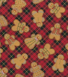 a plaid fabric with ginger cookies on it