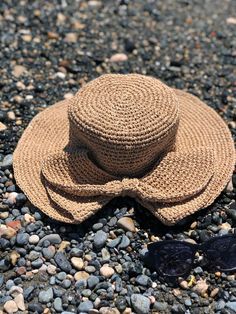 Handmade Crochet Raffia Hat, Straw Floppy Hat, Bow Hat Pattern, Woven Beach Hat, Summer Raffia Hat, Raffia Woven Hat, Handmade Gift Any woman must have this hat for every fashionista. Whether you keeping it to yourself or gifting someone you care, it will be unforgettable. You can combine your clothes with a bow hat pattern straw summer hat on summer days Handcrrafted in Turkey Hand-crocheted with care Hand crochet bow hat pattern floppy hat made from biodegradable paper yarn. Foldable and easy to travel with. This hat is light weight yet durable, breathable and environmental at the same time. This hat is Standart size and flexible. Shipment Process Time: 5-7 business days If you want different color please convo me. I will do my best to assist you 👍 ★ Discover our products on: https://ww Bohemian Boater Hat With Short Brim For Warm Weather, Beachy Brimmed Woven Hat, Beachy Woven Brimmed Hat, Bohemian Natural Sun Hat For Kentucky Derby, Natural Bohemian Sun Hat For Kentucky Derby, Brown Bohemian Woven Boater Hat, Bohemian Brown Woven Boater Hat, Handmade Sun Hat For Kentucky Derby Vacation, Bohemian Brown Hats For Warm Weather