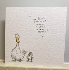 a card with an image of a mother duck and her baby duckling on it