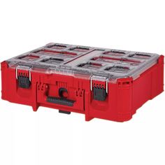 a red plastic case with four compartments on the bottom and two black latches at the top