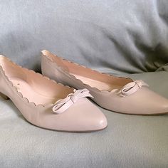 Beautiful Flats With A Great Scalloped Design And A Cute Bow. Leather Upper, With Rubber Outsole. Feminine Beige Flats For Spring, Cream Leather Ballet Flats For Spring, Feminine Low Heel Ballet Flats, Cream Almond Toe Flats For Spring, Cream Flats With Leather Sole For Spring, Beige Leather Ballet Flats For Spring, Chic Pink Flats With Low Heel, Feminine Beige Flats With Low Heel, Feminine Leather Heels With Round Toe