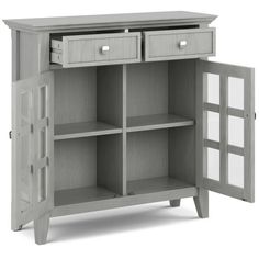 a gray cabinet with two drawers and one door open