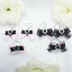 This listing is for our handmade  satin and lace bow rings and earrings ,earrings comes as a pair. Made from high quality satin ribbon and heart centrepiece. Has a ajustable ring easy to wear. Designed and embelished to complete the kawaii look!  Please your item/s from drop down menu.  Please allow 3-5 days for item to be made before dispatching.  Free UK  standard delivery available (3-5 working days). Please select a paid service for faster delivery service.  All international orders are sent tracked and signed (10 working days).  Any questions please do get in touch.  Custom orders are open,  if you are looking at design and need it in a different colour or maybe your own original design. Please get in touch to discuss your idea.  Thank you 💞🎀 Silver Harajuku Jewelry For Party, Silver Harajuku Style Party Jewelry, Black Harajuku Style Jewelry Gift, Cute Wedding Earrings For Valentine's Day, Cute Black Jewelry For Party, Wedding Heart-shaped Jewelry With Bow, Handmade Harajuku Jewelry For Party, Cute Bow Jewelry For Parties, Cute Bow Earrings For Wedding