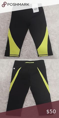 NEW XS Black and Florescent Green FABLETICS capris *Moisture-wicking  *Compression fabric  *All-way stretch  *Chafe-resistant  *UPF 50+  *Contrast wrap around panel *Waistband stays in place without digging  *Back zipper wristband pocket for key or card *Hits below the knee  BODY: 88% POLYESTER  12% ELASTANE  ☆ALL ORIGINAL TAGS ATTACHED☆ Fabletics Pants Capris Fabletics Shorts, Custom Bling, Compression Fabric, Active Wear Shorts, Crib Shoes, Running Shirts, Chevron Print, Lounge Shorts, Athletic Shirts