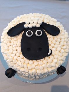 a cake decorated to look like a sheep