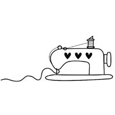 a sewing machine with hearts drawn on it's side and thread coming out of the top