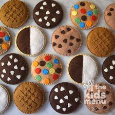 the cookies are decorated with different shapes and colors