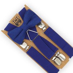 This beautiful Royal Blue bow tie & suspenders set is a perfect choice for a holiday, wedding, groomsmen, best man, ring bearer outfit, birthday celebration or any other special occasion! SIZING:   Х-SMALL: 6mo-4yrs  * Bow Tie: 4 in wide  * Suspenders: Adjustable from 16" to 27" (38 cm - 68 cm), X- back. SMALL: 5yrs-10yrs  * Bow Tie: 4 in wide * Suspenders: Adjustable from 20" to 32" (50 cm - 85 cm), X- back. MEDIUM: 10yrs-18yrs (up to 5'6") * Bow Tie: 4.5 in wide * Suspenders: Adjustable from 2 Blue Adjustable Bow Tie And Suit Accessories, Blue Bow Tie For Party Or Father's Day, Adjustable Blue Bow With Bow Tie Back, Blue Bow Tie With Bow Tie Back For Groom, Dapper Blue Bow Tie For Groom, Blue Bow Tie With Ribbon As A Gift, Blue Bow Tie For Wedding And Father's Day, Bow Tie And Suspenders Set For Father's Day Party, Dapper Blue Bow Tie For Party