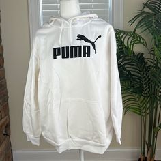 - Puma Hoodie - White Color With Black Logo - Brand New With Tags Casual Puma Logo Sweatshirt For Winter, Casual Long Sleeve Sweatshirt With Puma Logo, Winter Puma Logo Hooded Hoodie, Winter Hoodie With Puma Logo, Casual Puma Logo Long Sleeve Hoodie, Casual Winter Hoodie With Puma Logo, Casual Long Sleeve Hoodie With Puma Logo, Casual Long Sleeve Puma Hoodie, Casual Puma Logo Hoodie For Streetwear