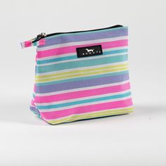 The perfect pouch to grab and go all summer long—made out of our newest poly woven fabric that’s super breathable. Tough and durable, yet smooth and flexible, the compact basket weave material gives sand and water an easy escape route. Great on its own or tossed inside a larger bag. Breathable, water-resistant, beach-chair-like material that allows air to circulate freely and sand and water to escape quickly. Flat, rectangular bottom stands upright even when empty Convenient finger loop on side Bridal Candles, Barefoot Dreams Blanket, Golf Socks Women, Downtown Raleigh, Scout Bags, Clear Purses, Birthday Club, Soft Sock, Beach Chair