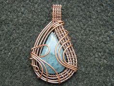 You will receive 1 Natural Aquamarine Wire pendant . Stone : Aquamarine Size: 53 to 55 mm long include bail Many thanks for you visit my store ♥ if you have any question please contact us. For wholesale Price Please Convo me. You can order different items as many you like . Bohemian Copper Wire Pendant Jewelry, Unique Copper Wire Teardrop Pendant Jewelry, Handmade Copper Wire Teardrop Pendant Jewelry, Unique Copper Teardrop Pendant Jewelry, Handmade Bronze Teardrop Pendant Jewelry, Raw Gemstone Ring, Art Wire, Wire Wrap Pendant, Gold Gemstone Ring