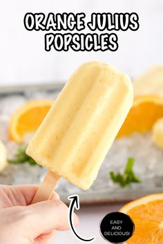 An orange julius popsicle being held in the air. Orange Popsicles, Fruit Popsicle Recipes, Frozen Popsicles, Berry Yogurt, Yogurt Popsicles, Orange Dreamsicle, Orange Julius, Orange Juice Concentrate, Homemade Popsicles