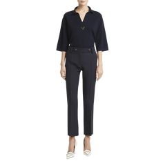 Valentino Garavani pants featuring a double button front detail High rise Side slip pockets; back welt pockets Slim straight legs Full length Button-tab/zip fly; belt loops Silk Made in Italy Chic Bottoms With Button Closure And Straight Hem, Straight Hem Pants With Button Closure For Work, Formal Ankle-length Pants With Button Closure, Formal Ankle-length Dress Pants With Button Closure, Elegant Semi-formal Bottoms With Buttons, Classic Workwear Pants With Button Cuffs, Elegant Pants With Button Closure And Straight Hem, Elegant Tapered Leg Bottoms With Buttons, Formal Straight Pants With Buttons