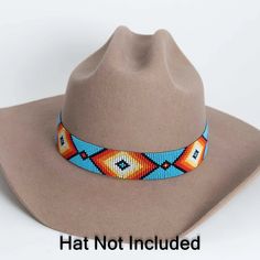 Strap on a hint of the Wild West with this Shawnee Beaded Turquoise Hat Band. Featuring a classic cowboy hat band, fedora hat band, or top hat hat band, this beaded hat band adds an enduring touch of the past with a hint of turquoise. Bold and stylish, the Shawnee Hat Band is perfect for a timeless, classic look!**Please note this is a hatband only** Blue Beaded Hat Bands For Festival, Custom Handmade Blue Hat Band, Adjustable Blue Southwestern Hat Band, Turquoise Beaded Hat Bands For Festival, Western-styled Hat Band For High Crown Hats, Turquoise Hat, Cowboy Hat Band, Cowboy Hat Bands, Headband Ideas