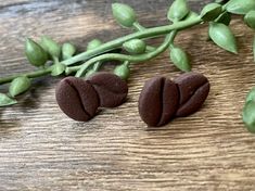 Coffee Bean  Stud Earrings- 1 pair Interested in the Moka Pot Studs, find them here: https://www.etsy.com/listing/1463480857/moka-pot-coffee-cafe-stud-earrings?click_key=24a22c44244b7a778c06906b238a6ea9cda251d0%3A1463480857&click_sum=e4f62657&ref=shop_home_active_2 Each piece is handmade and unique. Because of this, there could be slight variations in color and design from the picture shown but will be close! If you like the earring but would like a different color combination, just ask! I would be happy to accommodate! Polymer clay earrings usually are durable but there are some simple care instructions to help maintain their original beauty: - Store in a clean, dry place away from direct sunlight for extended periods of time. - To clean earrings you can rub water or rubbing alcohol on th Coffee Bean Stud Earrings, Moka Pot Coffee, Clean Earrings, How To Clean Earrings, Moka Pot, Rubbing Alcohol, Coffee Bean, Coffee Cafe, Color Combination