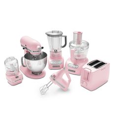 pink kitchen appliances are arranged on a white background