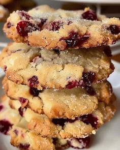 three cranberry cookies stacked on top of each other