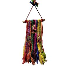 a multicolored scarf hanging from a hook