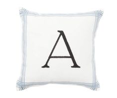 an embroidered pillow with the letter'a'in black and white stripes on it