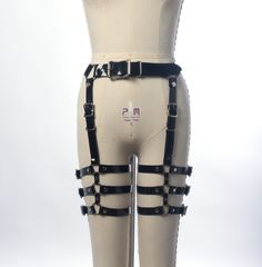 For many years I struggled to design a leg harness (a highly requested item) that I was happy with. It needed to be adjustable in all the right places for a detailed fit and range of motion, yet be structured enough so the straps wouldn't need constant adjustment or slide around while wearing it. Thanks to an inquiry from my friend DJ JQ, I got the push to really come up with something and this is the result. Designed to sit right at the natural waist, with four vertical buckled straps. Three ho Thigh Garter Harness, Leg Harness Outfit, Thigh Harness, Thigh Straps, Harness Outfit, Thigh Garter, Leg Harness, Leg Garter, Tactical Wear