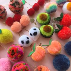 there are many different fruits and vegetables on the table together, all made out of felt