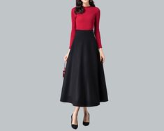 * A high-end long wool skirt with wide hem, very cool. * Made of wool blends, fully lined and with two side pockets. * Fixed waist with wide waistband and side invisible zipper. * Can custom make waist size and skirt length. * Material: Outer-50% wool, 50% polyester; lining-100% polyester * Washing instructions: Dry Clean Only * Size: True to US size, US 0-US 20 are available, you can let us know your usual size and height in your order. * Shipping: Free shipping Processing time : 5-7 Business d Black A-line Maxi Skirt For Winter, Office Wool Skirt In Black, Long Evening Skirt For Winter, Winter Evening Long Skirt, Evening Long Skirt For Winter, Evening Long Winter Skirt, Winter Evening Maxi Skirt With Lining, Flared Maxi Skirt For Fall Office Wear, Evening Maxi Skirt For Winter