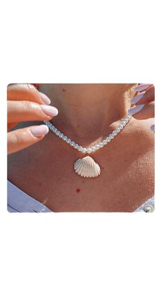 PRICES MAY VARY. 🐚Adds a touch of elegance and coastal charm to any outfit 🐚Encourages a relaxed, beach-inspired vibe wherever you go 🐚Can be customized with your favorite pieces for a personal touch 🐚Perfect for vacation wear, yet versatile enough for year-round styling Elevate any outfit with our Shell and Pearl Necklace, a perfect blend of elegance and coastal charm. This exquisite piece, inspired by the tranquil beauty of the sea, features a gold-plated chain adorned with lustrous pearls Shell And Pearl Necklace, Summer Beach Jewelry, Coastal Charm, Vacation Wear, Summer Necklace, Beach Inspired, Shell Pendant, Shell Necklaces, Summer Jewelry