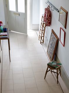 the hallway is clean and ready to be used as a place for pictures or other things