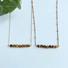 Tiger'eye Necklace Protection & Courage Healing Crystal - Etsy Iraq Everyday Spiritual Brown Necklace, Minimalist Brown Necklaces For Gifts, Minimalist Brown Necklace For Gifts, Minimalist Brown Necklace For Gift, Minimalist Brown Necklace For Everyday, Spiritual Hypoallergenic Necklace For Everyday, Spiritual Hypoallergenic Necklaces For Everyday, Hypoallergenic Round Bead Necklaces For Gifts, Hypoallergenic Necklace With Round Beads For Gift