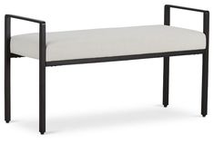 a black frame bench with a white cushion