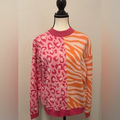 Beautiful Animal Sweater Size :Xs - Small Long Sleeve Crewneck 55% Viscose, 28% Polyester, 17 % Nylon Bust : 42” Body Length: 24” Sleeve Length: 21” Super Soft And Bright Colors! Trendy Pink Sweater With Graphic Print, Trendy Pink Color Block Sweater, Trendy Pink Sweater, Fitted Graphic Print Sweater For Spring, Pink Graphic Print Fall Sweater, Pink Graphic Print Sweater For Fall, Velvet Sweater, Animal Sweater, Patterned Crop Top