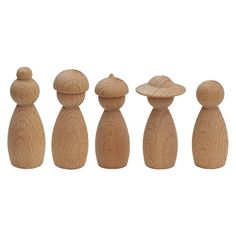 five wooden dolls lined up in a row