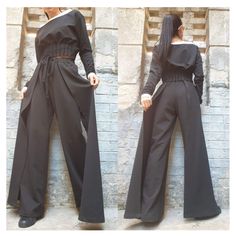 "Spectacular cotton two-piece set. Short blouse with long sleeves and open neck in a combination of black and white and ankle-length pants with a high waist with ties at the waist. The pants have a wide leg and sewn two rails on both sides that give asymmetry and elegance🤩Extravagant designs and high quality fabrics. The item from the pictures is size S  For more information feel free to ask questions. Material &Care Cotton and elastane  Machine wash 30oC Hand wash at low temperatures Do not ma Cotton Two-piece Set With Long Sleeves, Cotton Two-piece Long Sleeve Sets, Fitted Cotton Wide Leg Sets, Fitted Cotton Sets With Wide Leg, Fitted Cotton Set With Wide Leg, Lady Pants, Short Blouse, Gothic Pants, Gothic Costume