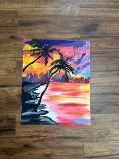 an acrylic painting of a palm tree on a wood floor by the ocean