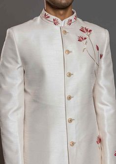 Latest Men Cream Hand Embroidery Designer Indian Floral Sherwani Designer custom made ivory Hand floral fully embroidered floral sherwani with chudidar in UK . The latest heavy silk embroidered sherwani is best choice for groom . It is suited for Indian and Pakistani wedding wear . One of the standout features of this sherwani is the intricate embroidery adorning its surface. Our skilled artisans have meticulously handcrafted every detail, using fine threads and intricate patterns that showcase traditional Indian craftsmanship at its best. The embroidery showcases a harmonious blend of motifs, ranging from floral designs to creating a visually stunning ensemble that captures attention and admiration . Please note there can be slightly difference between the image and the product due t Kurta Men, Simple Embroidery Designs, Men Cream