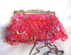 Beautfiul Womens Hot-Pink Sequin and Beaded Evening beaded Bag Clutch Purse This stunning beaded handbag has a designer beaded pattern for classy and elegant look.   This brand new eye-clutching bag is perfect for evening party and ball. Size:  (WxHxD) 8.5" x 5" x  1.5" (21cm x 12.5cm x 3.5 cm) Color:  Hot-Pink Material:  Satin/Sequin, Beaded   (13 ozes) Strap:  47" metal shoulder strap (removable) Color of metal parts:  silver Feature:  clasped with an inside mobile phone pocket. The outside is Summer Party Beaded Bag, Summer Party Beaded Bags, Pink Sequin Evening Bag, Summer Pink Beaded Bag, Festive Pink Embellished Bag, Festive Pink Embellished Bags, Summer Party Embellished Bags, Embellished Party Bags For Summer, Red Sequined Party Bags