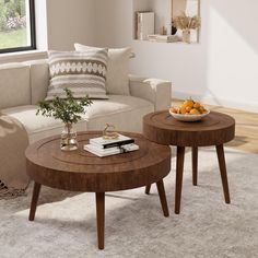 two wooden tables sitting on top of a white rug