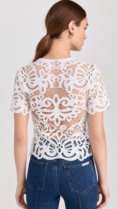 Fabric Weight: LightweightLightweightHeavyweightFabric: Lightweight lacePolished gold-tone decorative buttonsRound necklineShort sleevesFlap breast pocketsSheerShell: 100% polyesterTrim: 100% cottonDry cleanImported, ChinaStyle #SELFP30804 Guipure Lace Top, White Lace Top, Guipure Lace, Decorative Buttons, White Shop, White Top, Self Portrait, White Tops, Latest Design