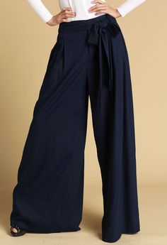 "A wide leg pants, the navy blue pants look approachable In everyday life, with a pair of comfortable flat shoes, a soft large handbag, giving a quiet, comfortable holiday mood. The palazzo pants also can looke more feminine, you can match a lace vest or a white blouse as the model, it will giving the wide leg crotch new style. The wide leg pants is a perfect combination for you to have a slim waist and a beautiful hip, With high-heeled shoes, you can immediately become highly sensational. DETAI Blue Linen Wide Leg Pants, Blue Linen Ankle-length Wide Leg Pants, Elegant Navy Wide Leg Pants, Navy Summer Wide Leg Pants, Navy Wide Leg Pants For Summer, Wide Leg Pants Summer, Long Linen Pants, Beautiful Hips, Maxi Pants