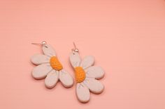 Half Daisy polymer clay earrings, available in white and orange.   ---------------------------------- Please note each item is handmade and therefore may differ slightly from the pictures.  To clean your clay earrings simply wipe with a damp cloth. To get the longest life out of your earrings we suggest removing them before swimming, showering, sleeping or apply product to your face and hair. White Polymer Clay Flower Earrings For Everyday Wear, Everyday White Flower Earrings In Polymer Clay, Everyday White Polymer Clay Flower Earrings, Handmade White Flower Earrings For Everyday, Hand Painted White Clay Jewelry, Cute Hand Painted White Jewelry, Cute White Hand Painted Jewelry, Everyday White Clay Jewelry, White Polymer Clay Flower Earrings For Gift