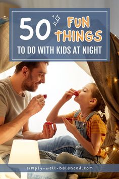 a father and his daughter are sitting on the bed with their food in hand, while they