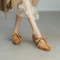 This pair of vegetable-tanned horsehide lace-up shoes is made from natural horsehide leather, known for its soft, durable texture that develops a unique patina over time, showcasing the superior quality of the shoes. The delicate bow lace-up design adds a touch of sweetness, blending the casual style of loafers with the fashion-forward appeal of flats, making them perfect for both daily outings and leisurely moments. We offer three distinct and elegant colors: pink, white, and beige, each carefu Vintage Oxford Lace-up Shoes For Fall, Vintage Flat Heel Leather Shoes For Spring, Vintage Leather Shoes With Flat Heel For Spring, Vintage Leather Flat Heel Shoes For Spring, Vintage Slip-on Leather Shoes For Spring, Vintage Leather Flats For Spring, Vintage Spring Loafers With Round Toe, Vintage Leather Flats With Low Heel, Fall Lace-up Loafers With Rubber Sole