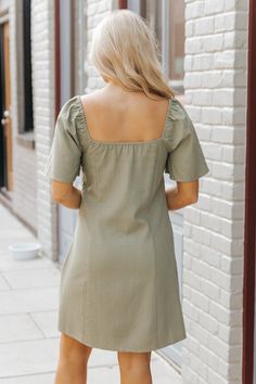 Step into fall with this gorgeous Olive Linen Mini Dress! Expertly crafted from a blend of lightweight rayon and linen, this Olive Bell Sleeve Linen Mini Dress features short bell sleeves and delicate non-functional button details. Designed with a side zip closure, it offers a comfortable and flattering fit for any occasion. Lined with 100% rayon for added comfort! Bright Colors Fashion, Short Bell Sleeves, Loungewear Dresses, Casual White Dress, Linen Mini Dress, Power Dressing, Influencers Fashion, Basic Tops, Black Maxi Dress