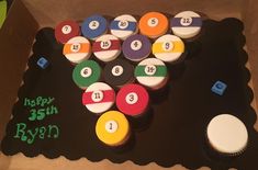 cupcakes with numbers on them in a box