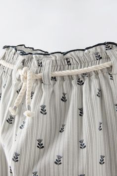 PRINTED DRAWSTRING PANTS - Gray | ZARA United States Spring Cotton Bottoms With Contrast Trim, Spring Loungewear Bottoms With Contrast Trim, Summer Cotton Pants With Contrast Stitching, Cotton Pants With Contrast Stitching For Summer, Cotton Paperbag Waist Pants With Elastic Band, Cotton Paperbag Waist Pants With Elastic Waistband, Spring Bottoms With Drawstring And Paperbag Waist, Zara Casual Bottoms With Ruffles, Staple Dress