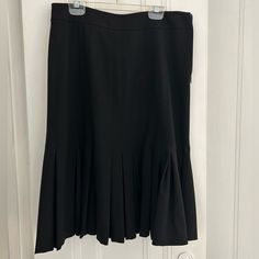 Lena Gabrielle Brand Black Midi Length Skirt. Size 4. Sits At The Natural Waist, Fitted With Vertical Stitch Seam Details, Flares Out At The Bottom With Pleats To A Tulip Silhouette. Side Zip And Hook & Eye Closure. Stretch Blend, Unlined. Never Worn, Brand Tag Crossed Out By The Store To Prevent Returns, But Has No Defects Or Flaws. True Deep Black, Darker Than In Photos. Great For The Office, Night Out, A Classic That Will Never Go Out Of Style. Bought It For Myself But Am No Longer This Size, Fitted Black Bottoms With Pleated Hem, Fitted Black Skirt With Pleated Hem, Fitted Black Pleated Skirt, Fitted Formal Bottoms With Pleated Hem, Formal Fitted Bottoms With Pleated Hem, Formal Black Bottoms With Pleated Hem, Black Pleated Hem Skirt For Formal Occasions, Tulip Silhouette, Zara Midi Skirt