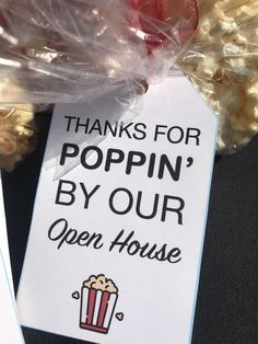 there is a sign that says thanks for poppin'by our open house